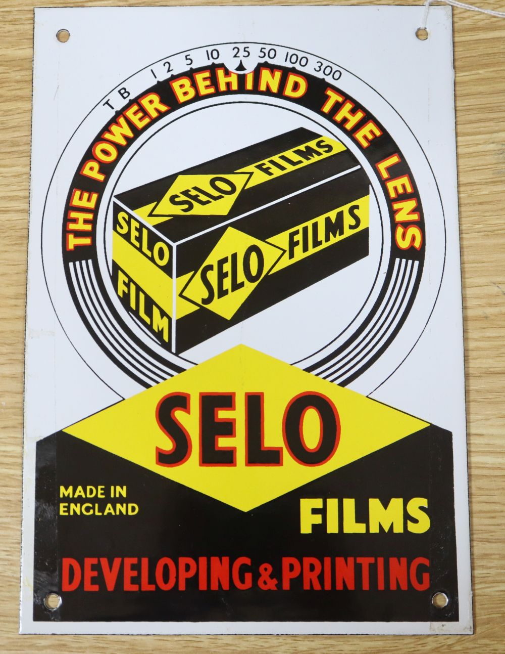 The Power Behind The Lens Selo Films developing and printing enamel sign, 26 x 18cm